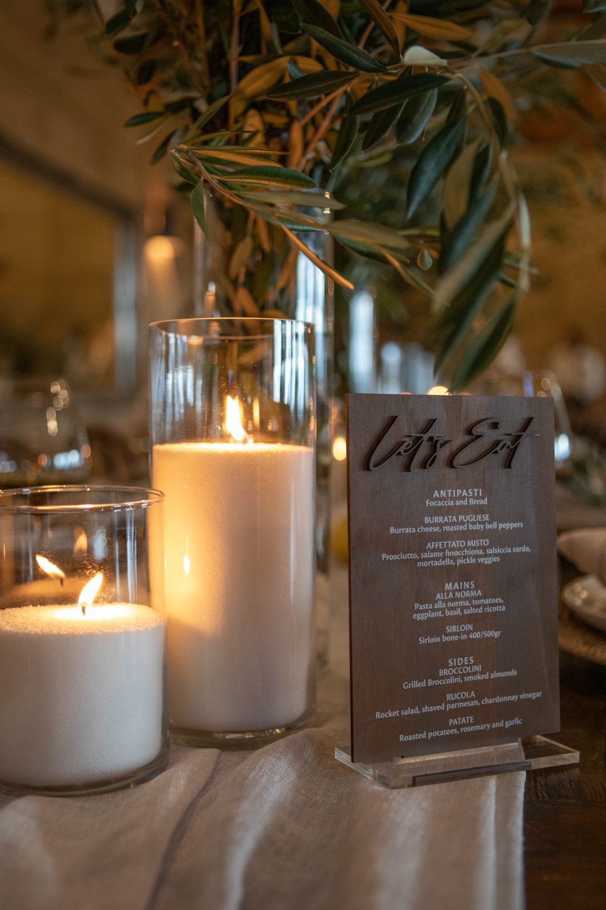 Pillar candles in glass with menu